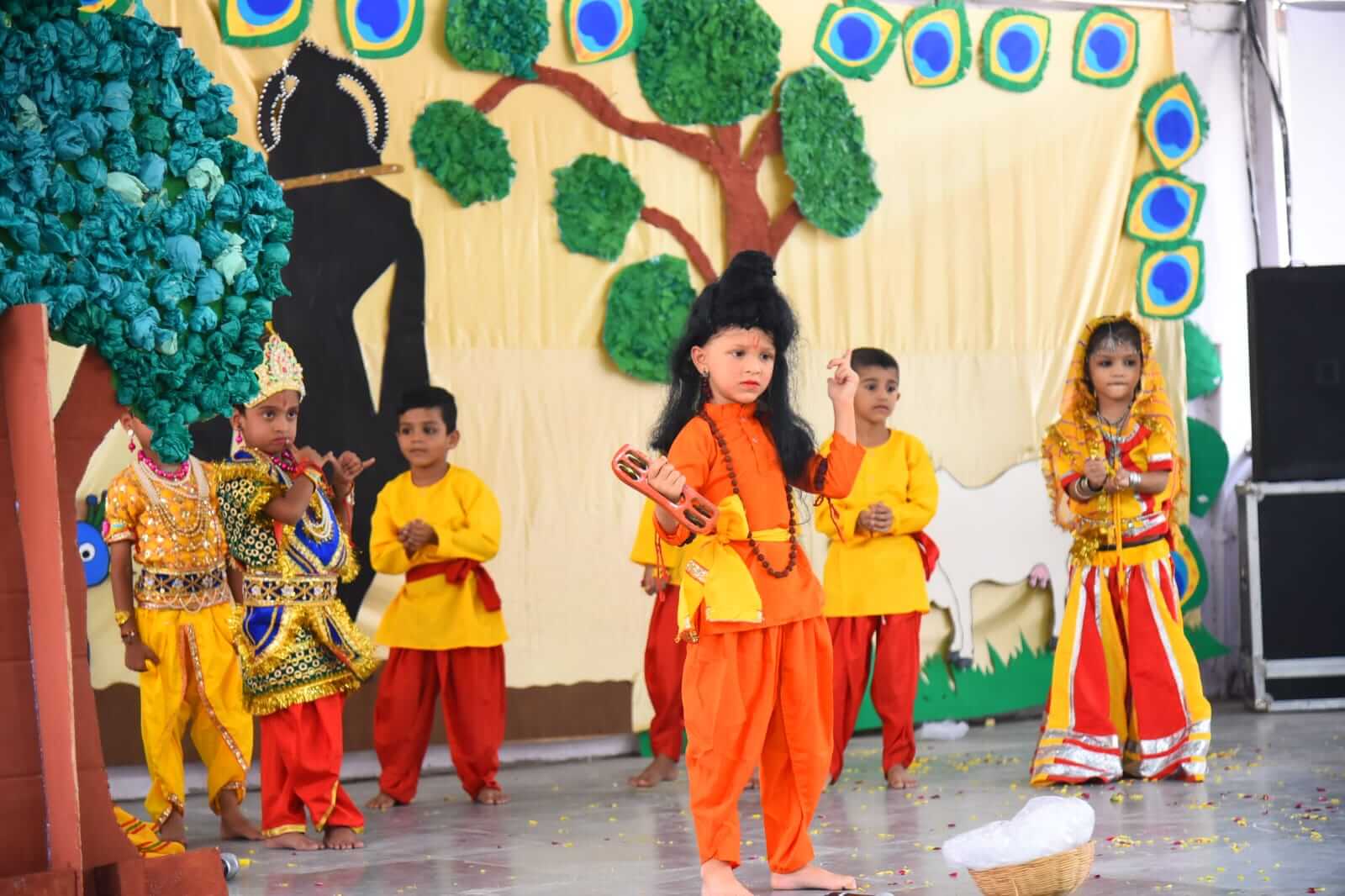 Children performing a Krishna-themed cultural act at Sandipani Play School